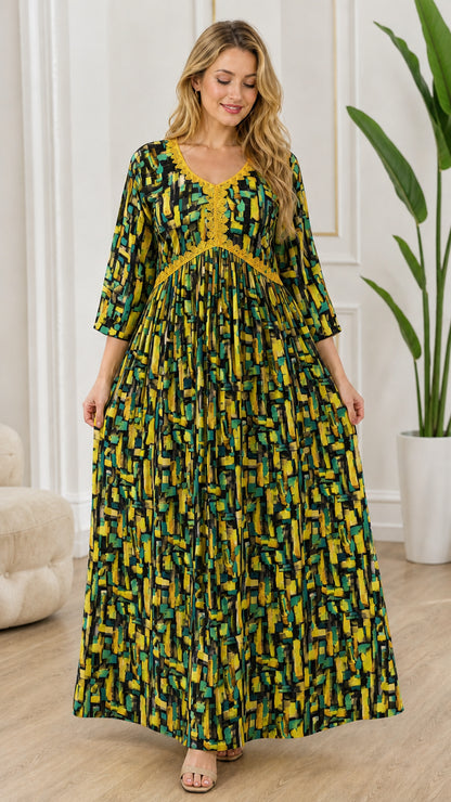 Full-length front view of model wearing black and multicolor abstract print maxi dress