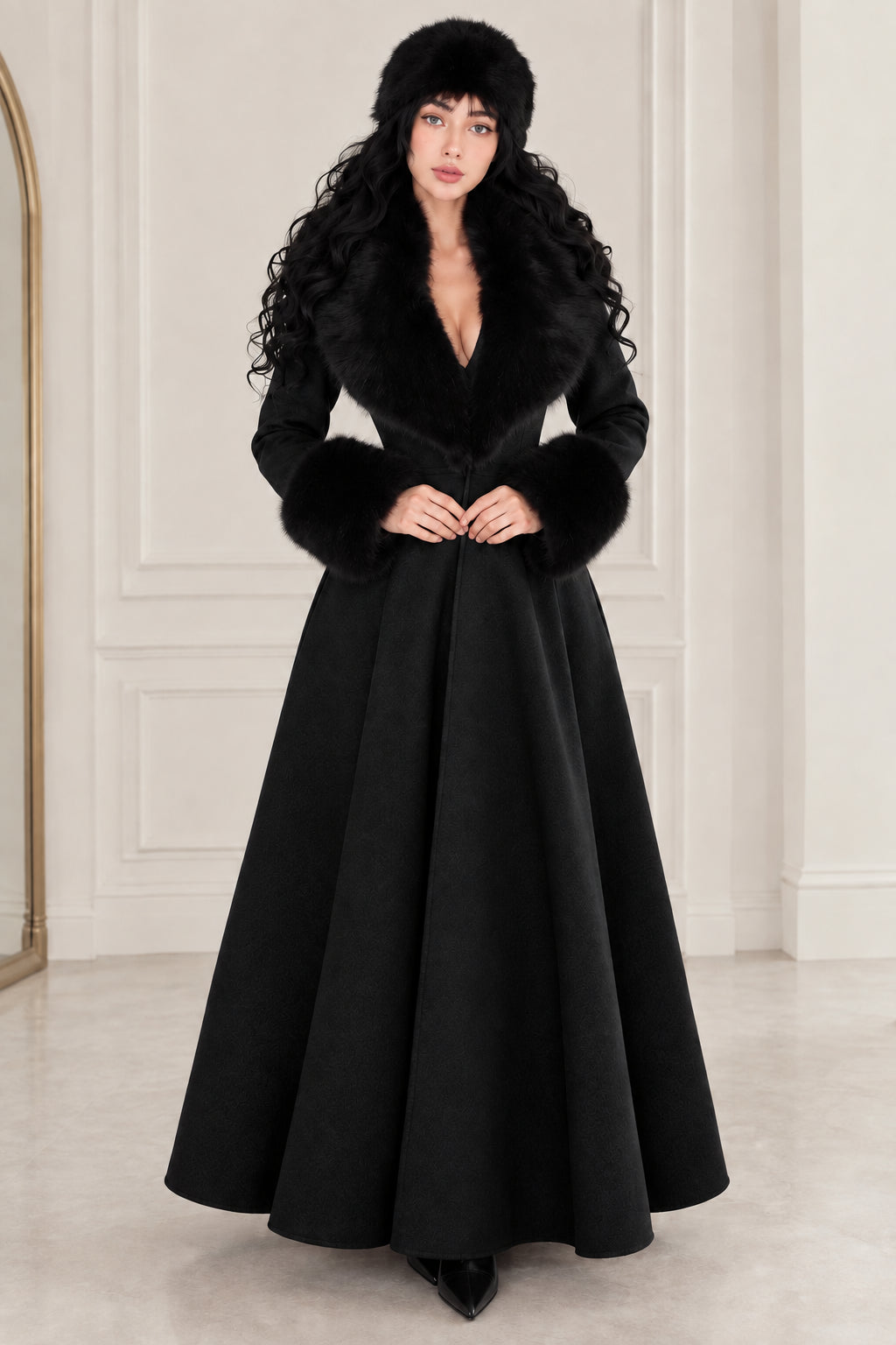 Front view of woman wearing classic black maxi swing coat with black faux fur trim