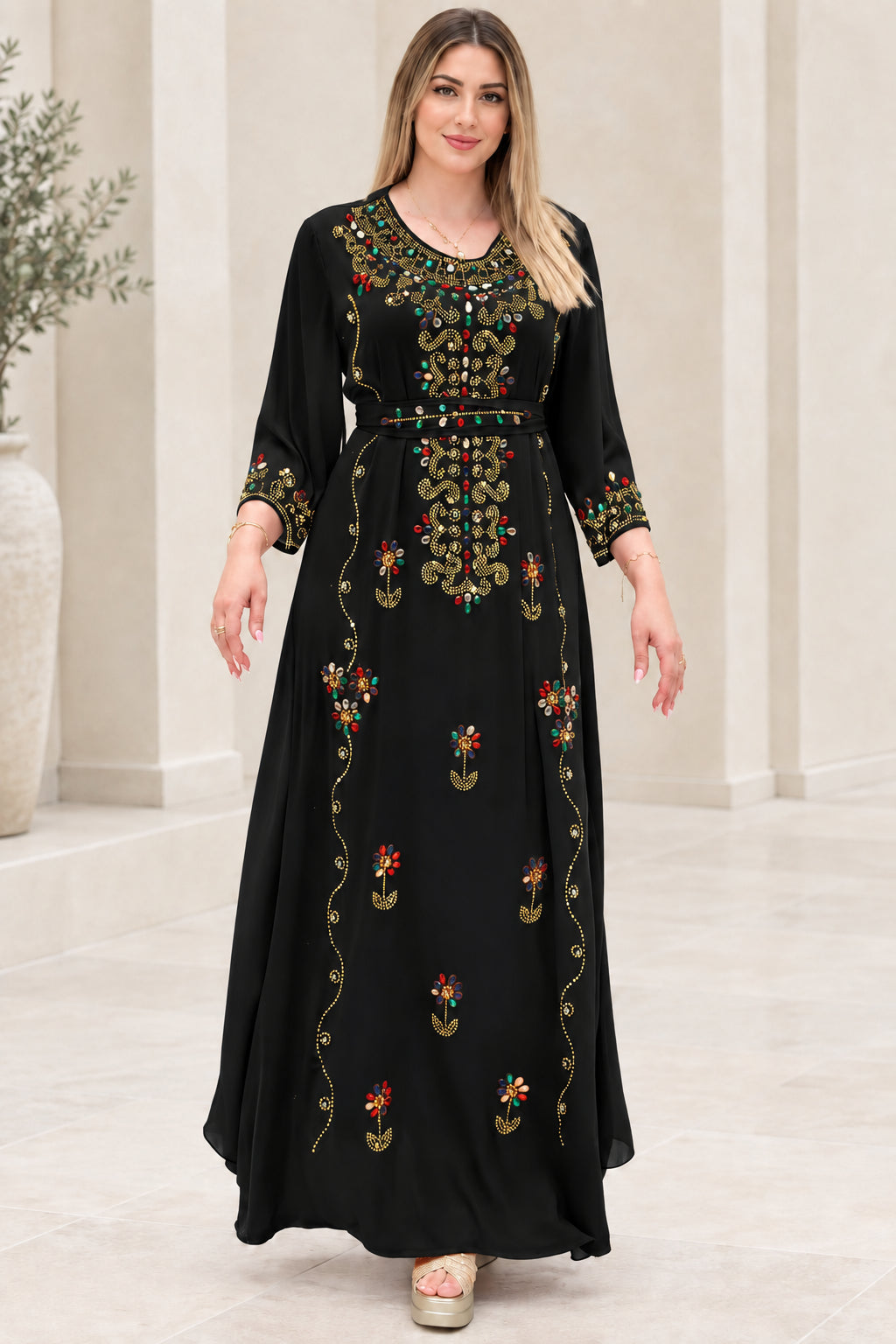Front view of black embellished kaftan maxi dress with tie belt