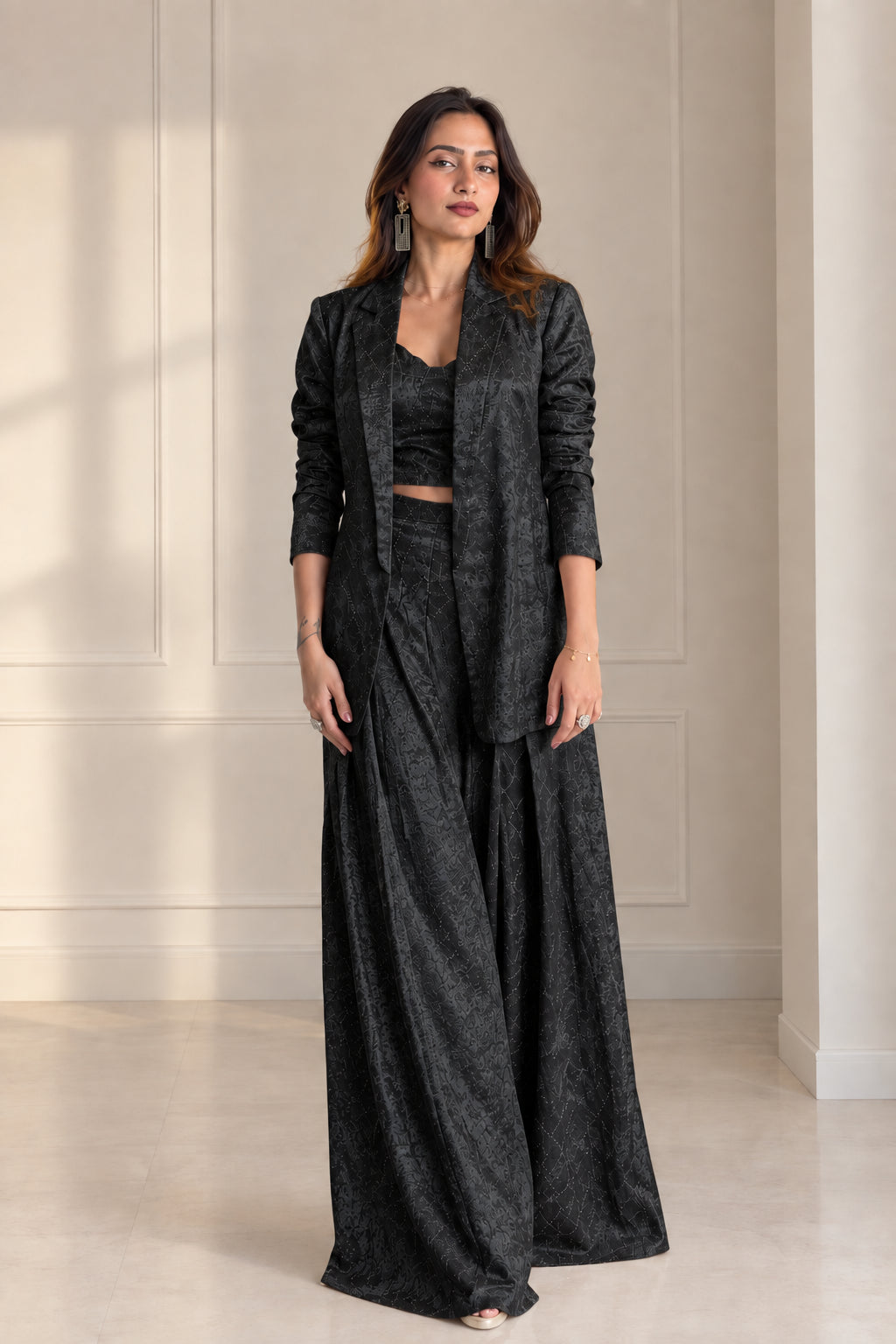 Front view of model wearing Black textured jacquard 3-piece evening suit set
