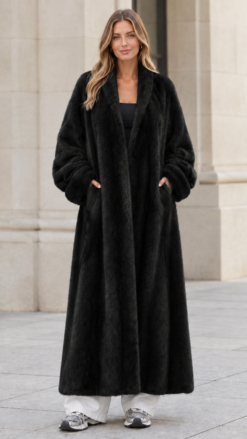 Front view of woman wearing classic black longline plush faux fur coat