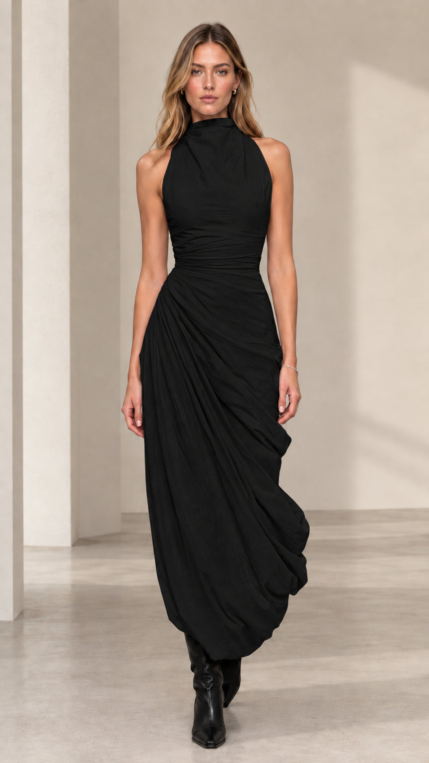 Front view of model wearing black high neck ruched draped maxi dress