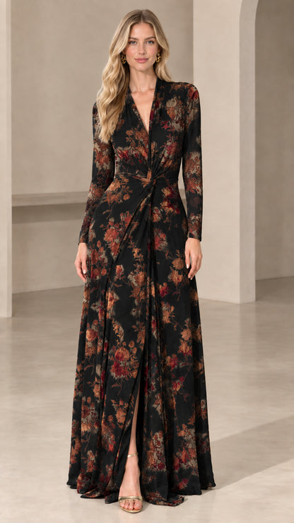 Front view of woman wearing black floral long sleeve twist-front maxi dress