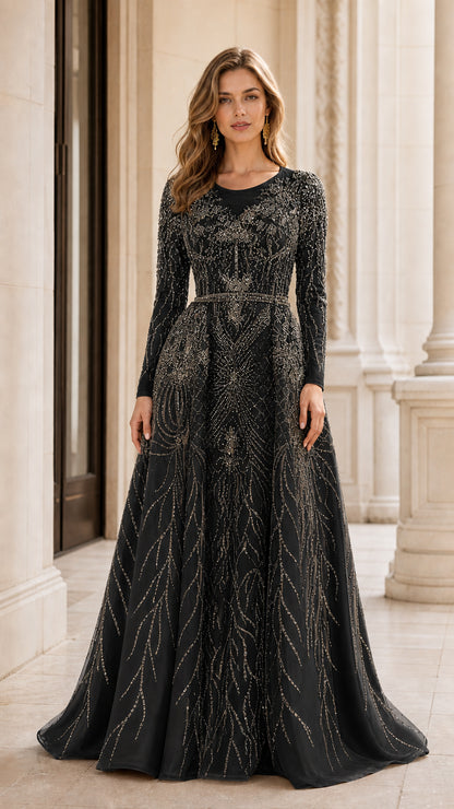 Full-length front view of black beaded long sleeve evening gown