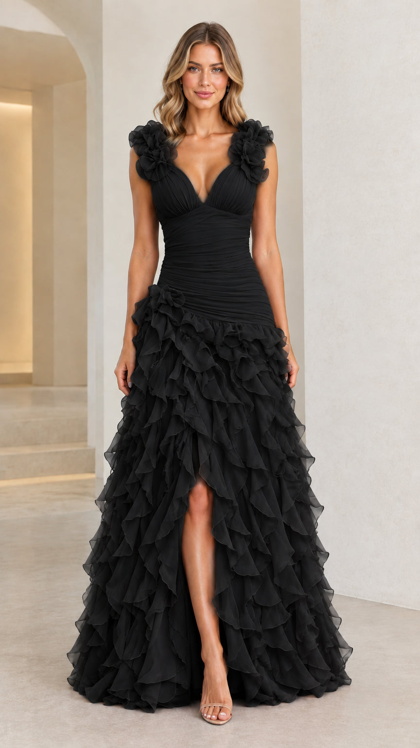 Front view of woman wearing Black tiered ruffle slit maxi dress