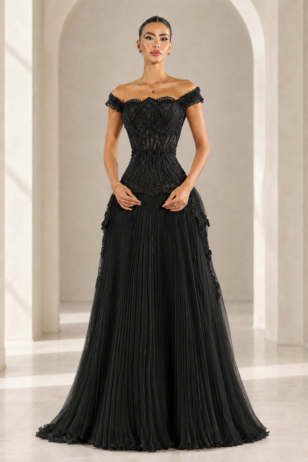 Front view of Black off-the-shoulder pleated corset evening gown