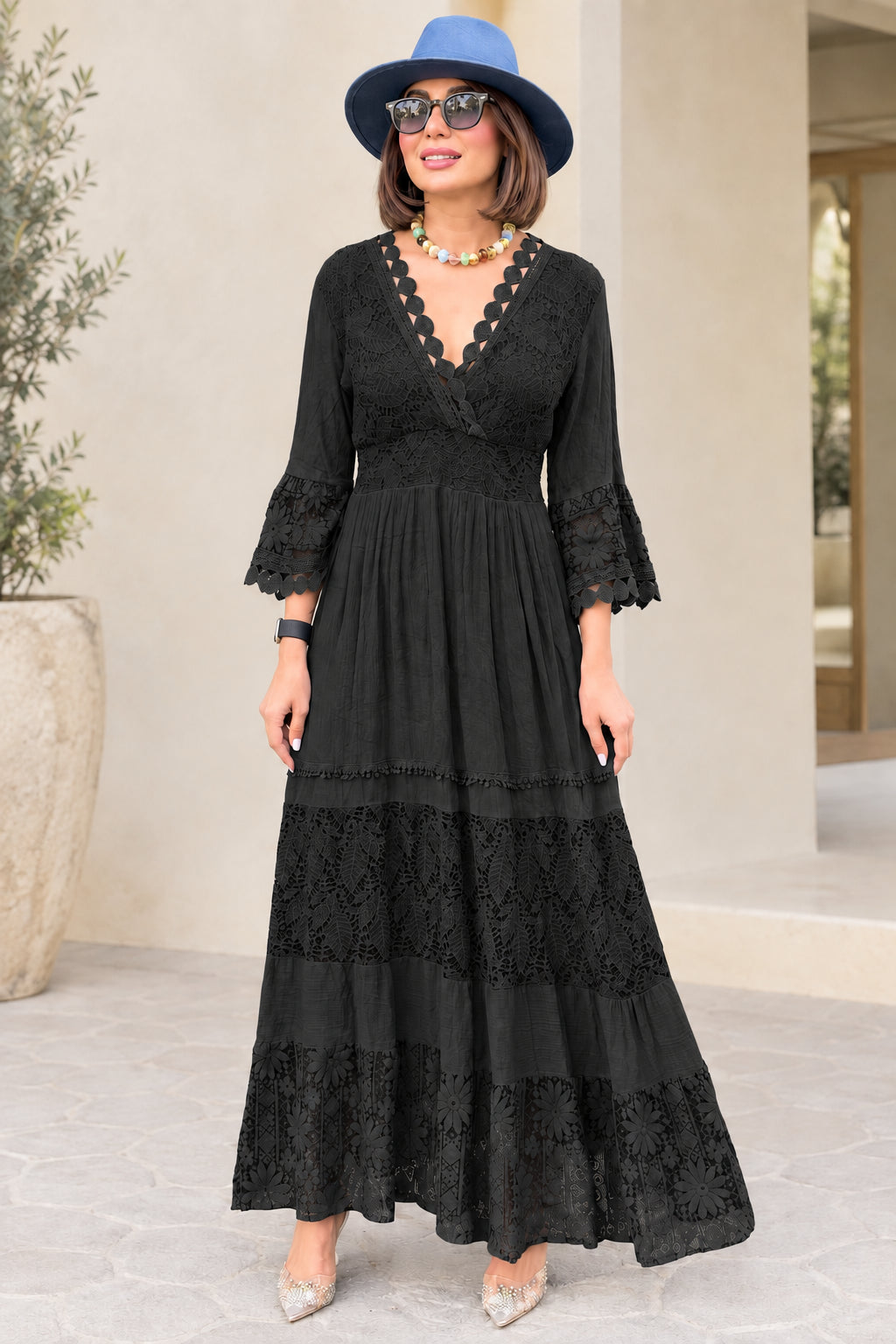 Black lace tiered maxi dress with scalloped V-neckline and 3/4 bell sleeves