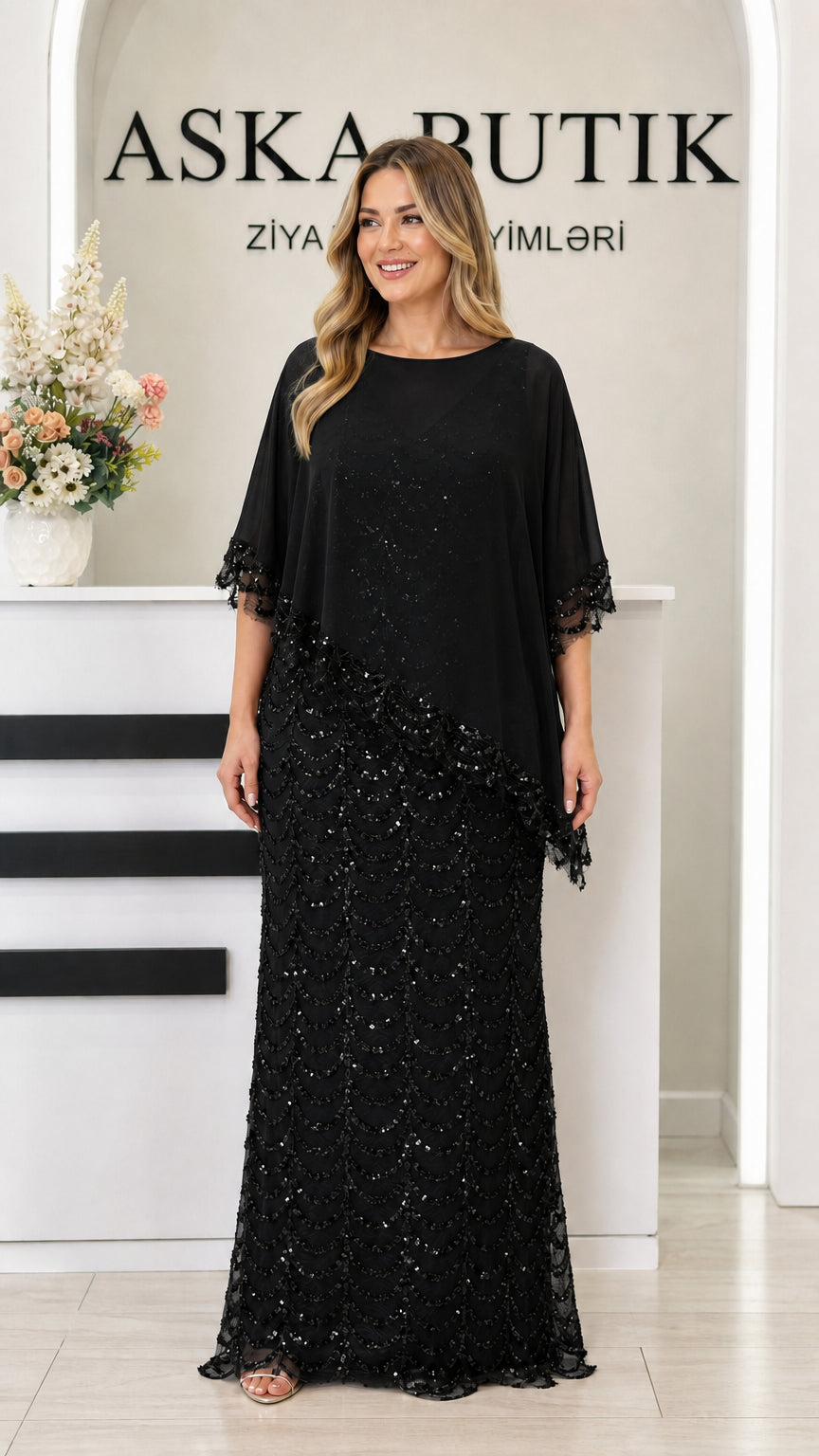 Black sequin maxi gown with draped chiffon capelet overlay