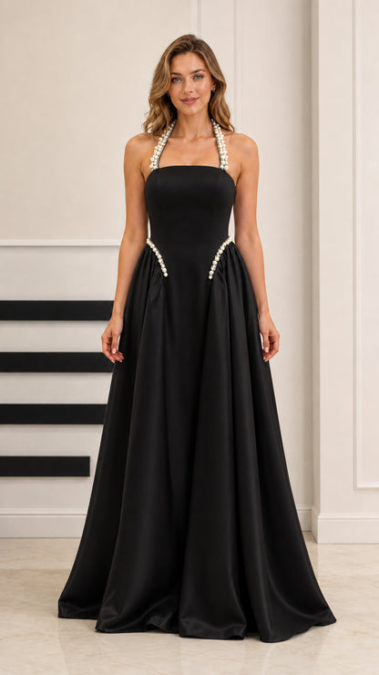Black satin halter A-line evening gown with pearl embellishments