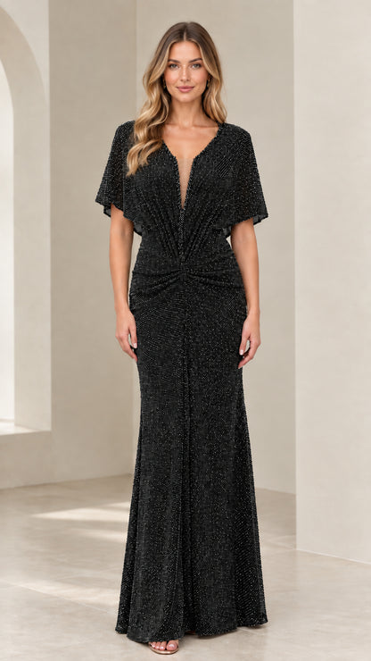 Model wearing Black flutter sleeve plunge neckline shimmer evening gown