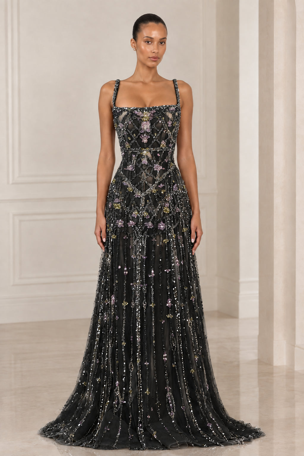 Front view of model wearing Black crystal embellished square neck evening gown