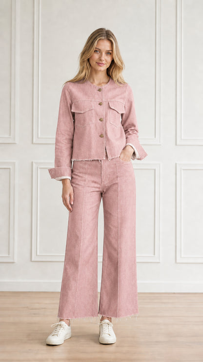 Model wearing dusty pink denim jacket and wide-leg pants co-ord set