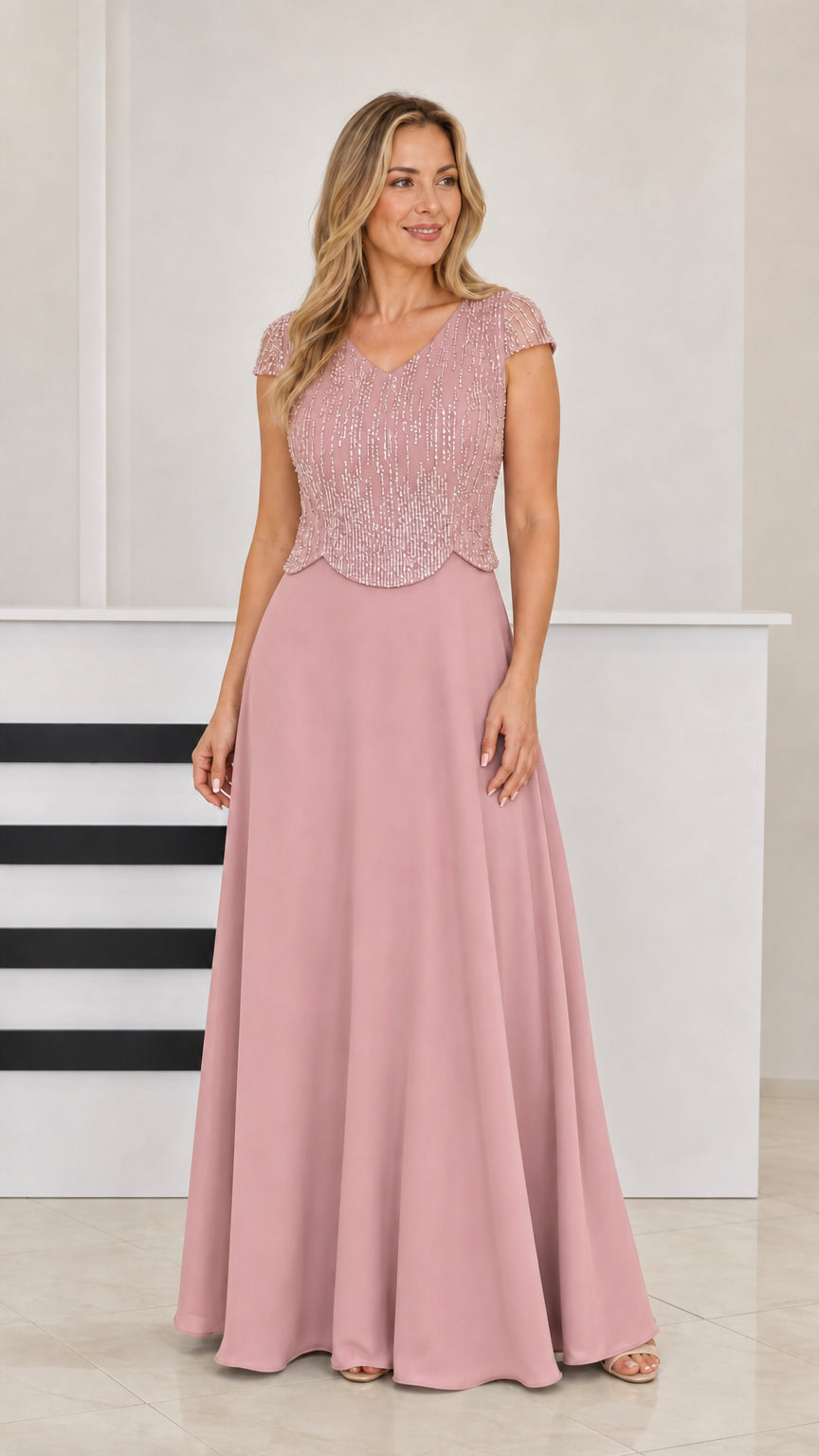 Woman wearing Dusty Rose beaded bodice chiffon evening gown