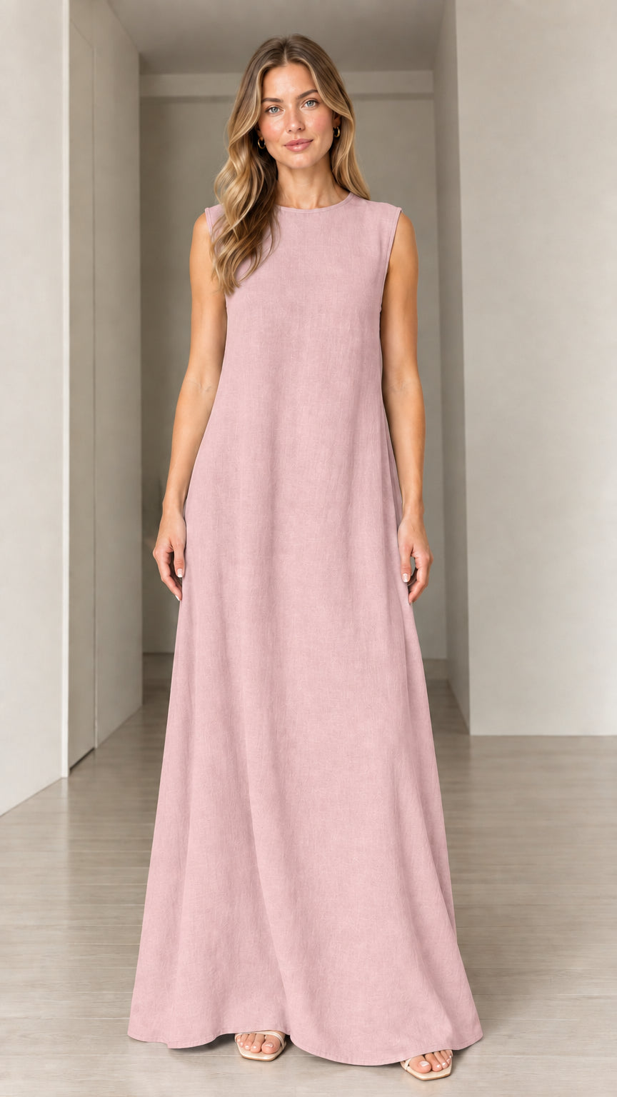 Front view of woman wearing Dusty Pink sleeveless crewneck maxi dress
