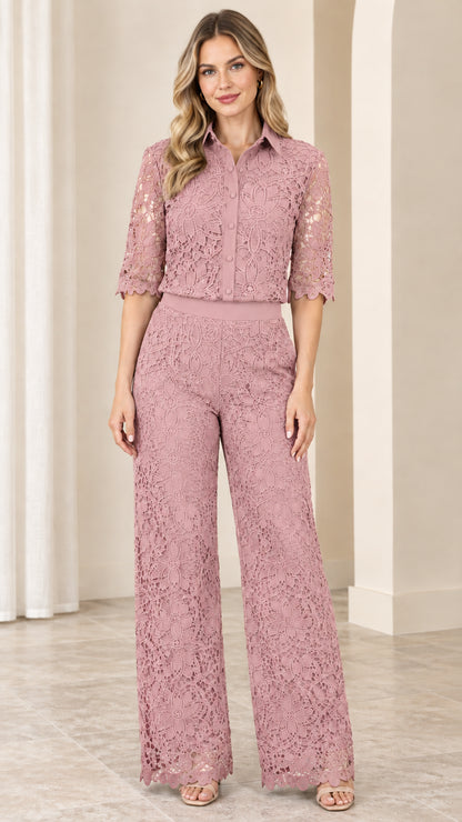 Front view of model wearing dusty rose pink floral lace collared jumpsuit