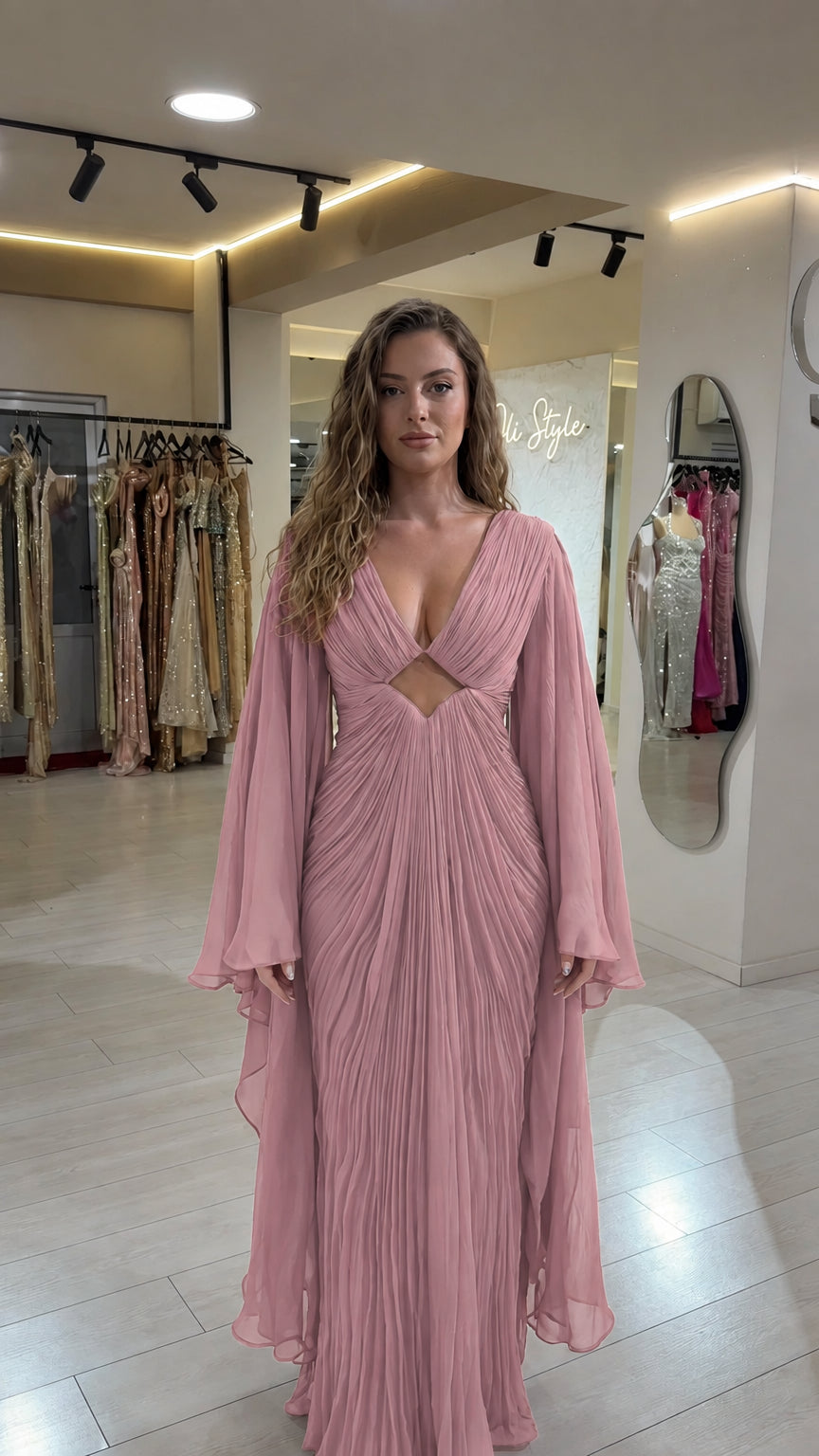 Dusty rose pink pleated floor-length evening gown with cape sleeves