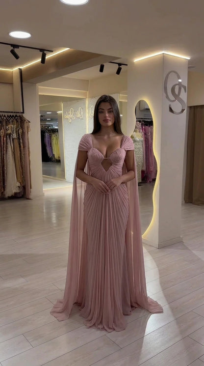 Front view of Dusty Pink pleated formal evening gown with cape drape