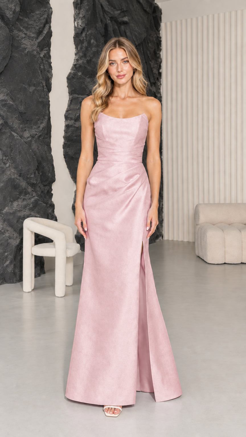 Full-length front view of woman wearing Blush Pink strapless formal gown