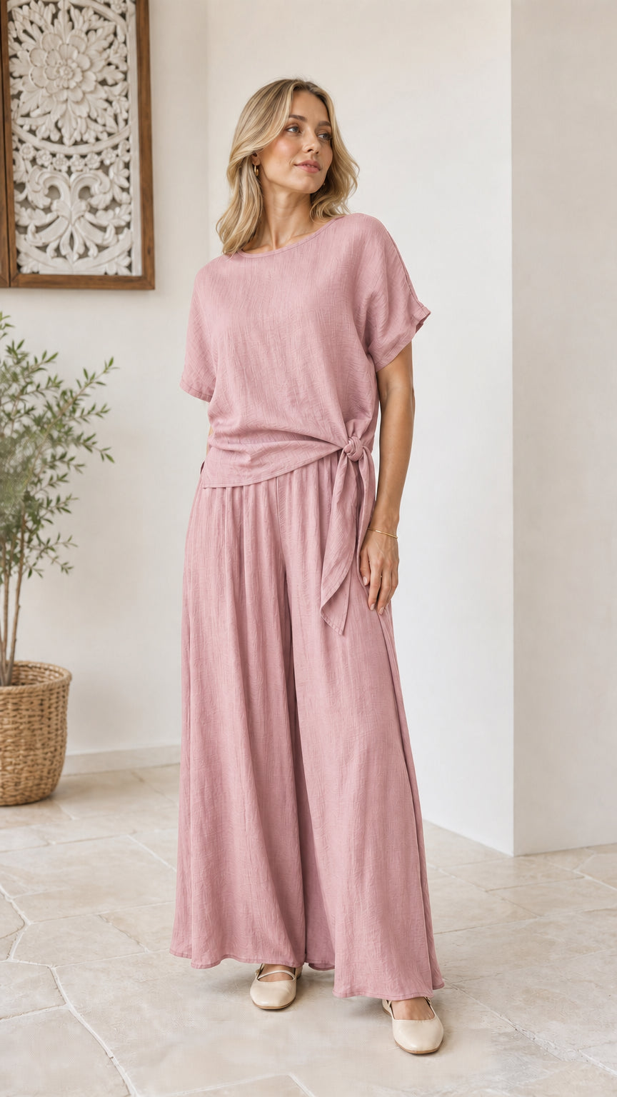 Model wearing dusty pink casual two-piece wide-leg matching pant set