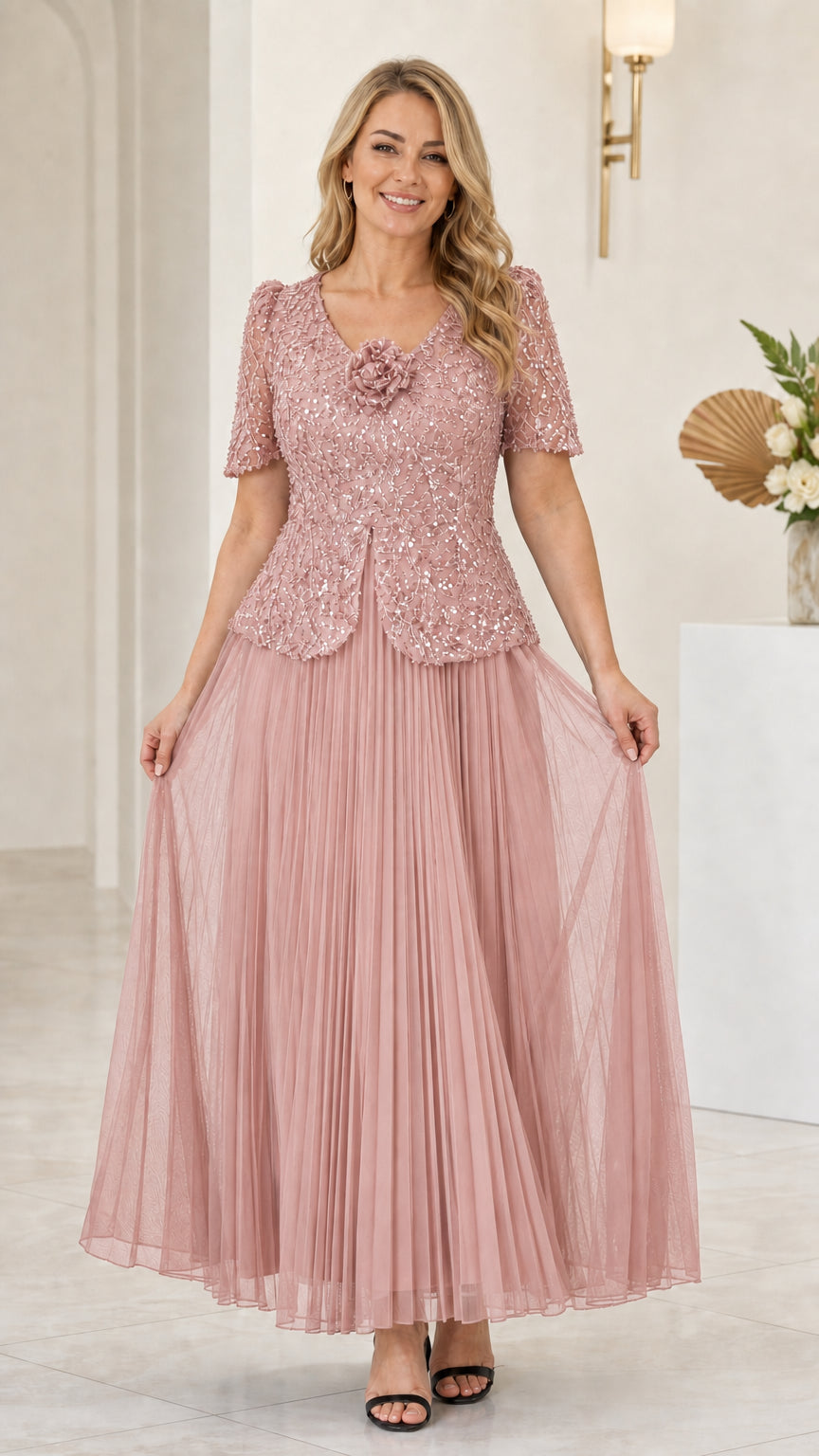 Front view of dusty rose sequin bodice and pleated tulle formal dress