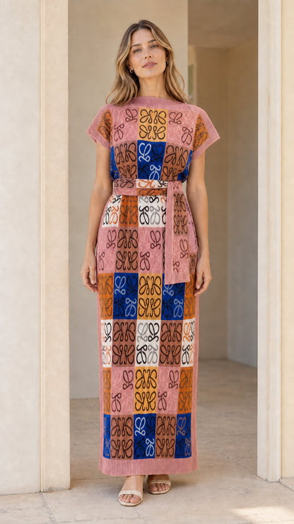 Model wearing geometric jacquard knit column maxi dress in Pink Multi