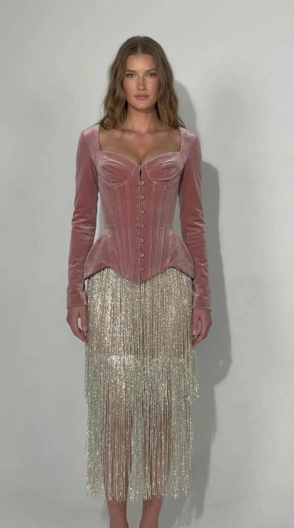 Dusty pink velvet corset long sleeve dress with shimmering fringe skirt