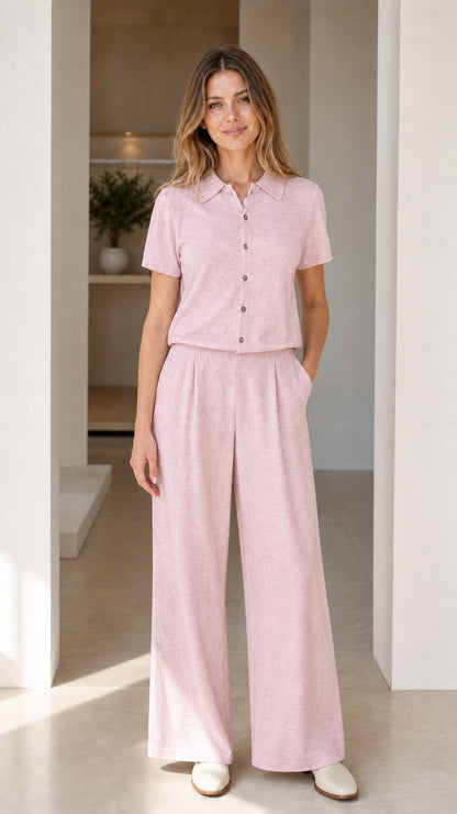 Full-length front view of blush pink short sleeve polo and wide-leg pants matching set