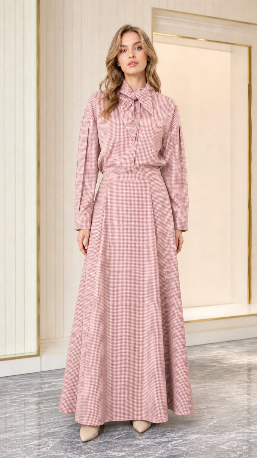 Model wearing dusty pink houndstooth long sleeve tie-neck maxi dress