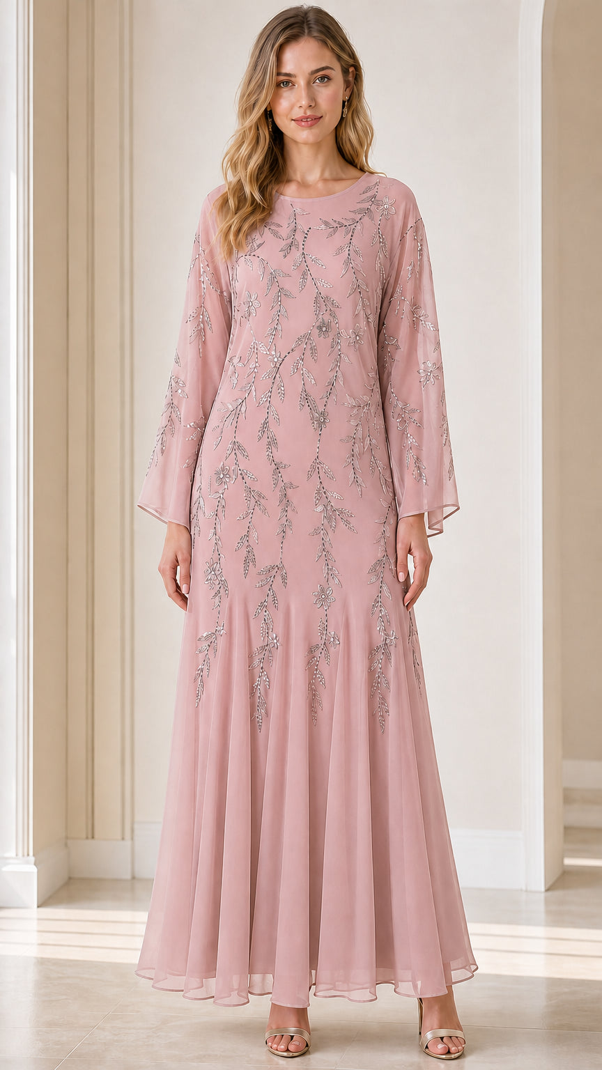 Front view of model wearing pink sequin embroidered maxi dress