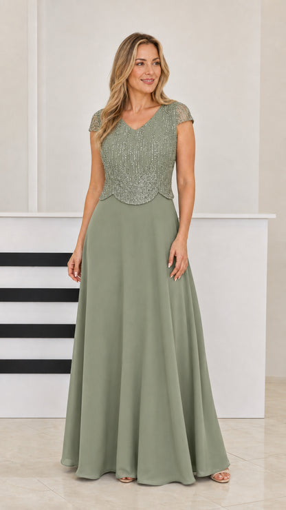 Woman wearing Sage Green beaded cap sleeve formal evening dress