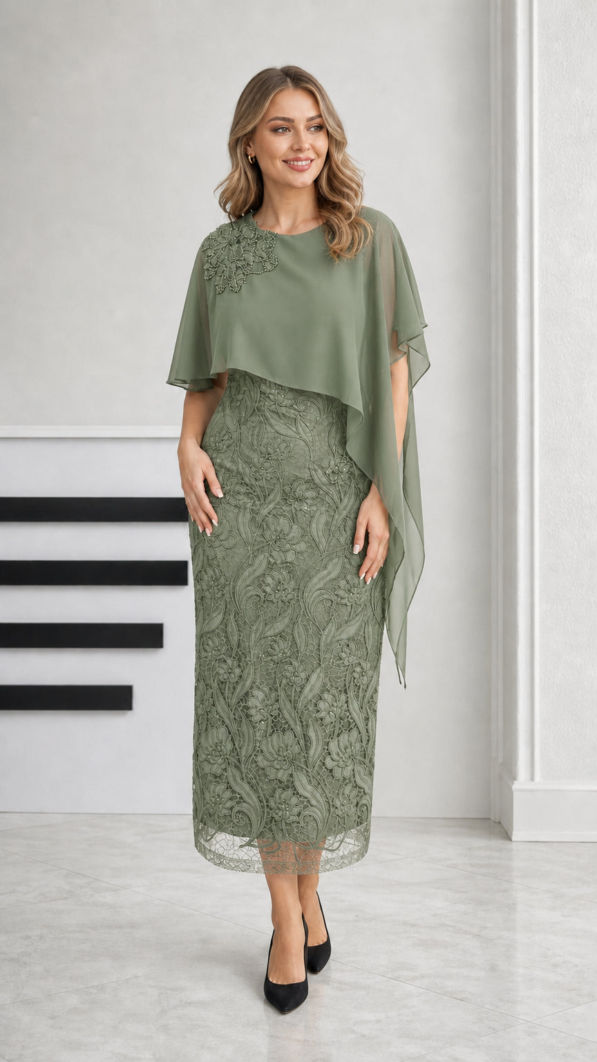 Sage green lace column midi dress with asymmetrical cape overlay
