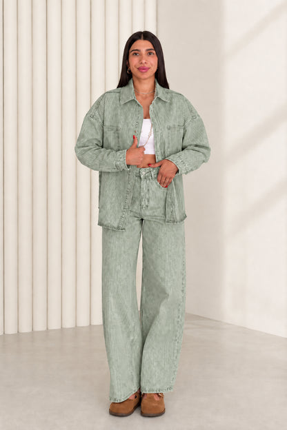 Model wearing sage green striped denim shacket and wide leg pants set
