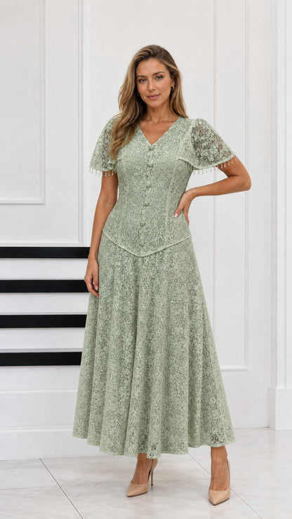 Full-length view of sage green floral lace maxi evening dress
