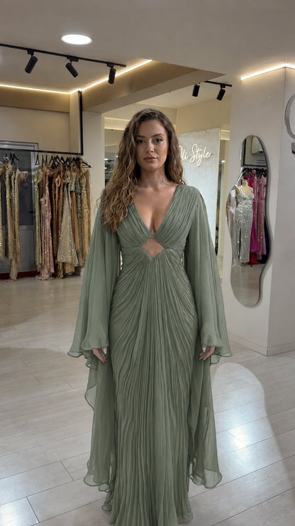Sage green pleated V-neck evening dress with cutout and cape sleeves