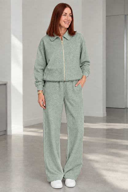 Woman wearing Sage Green collared zip jacket and wide-leg pants set