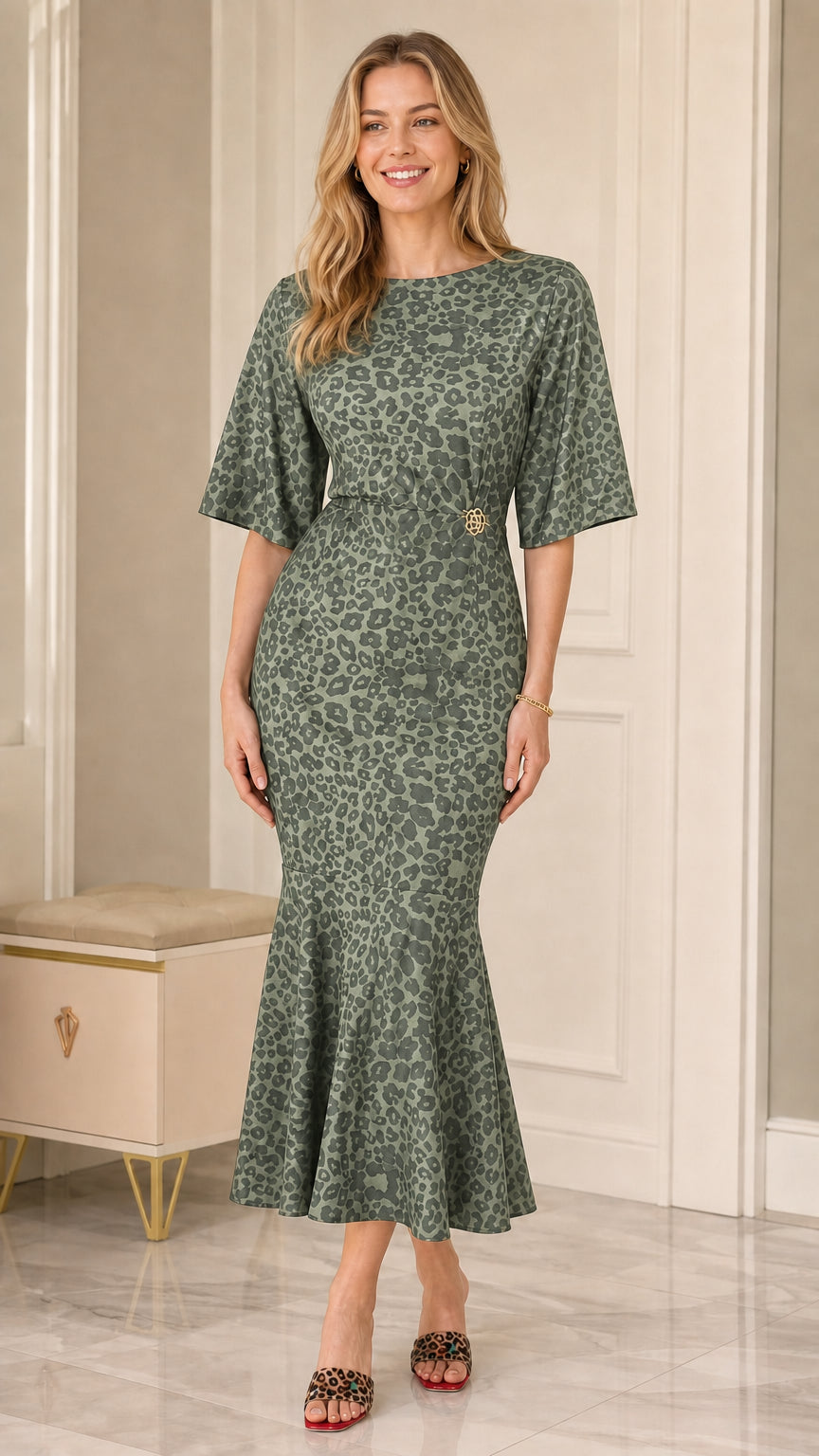 Model wearing Sage Green leopard print mermaid midi dress with waist accent