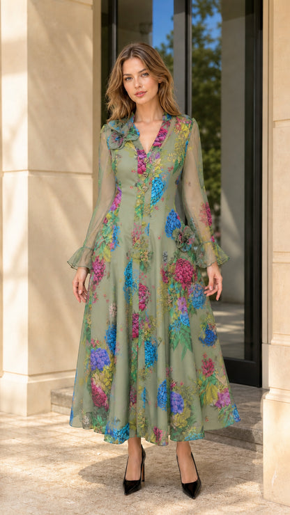 Full front view of model wearing sage green floral print long sleeve maxi dress