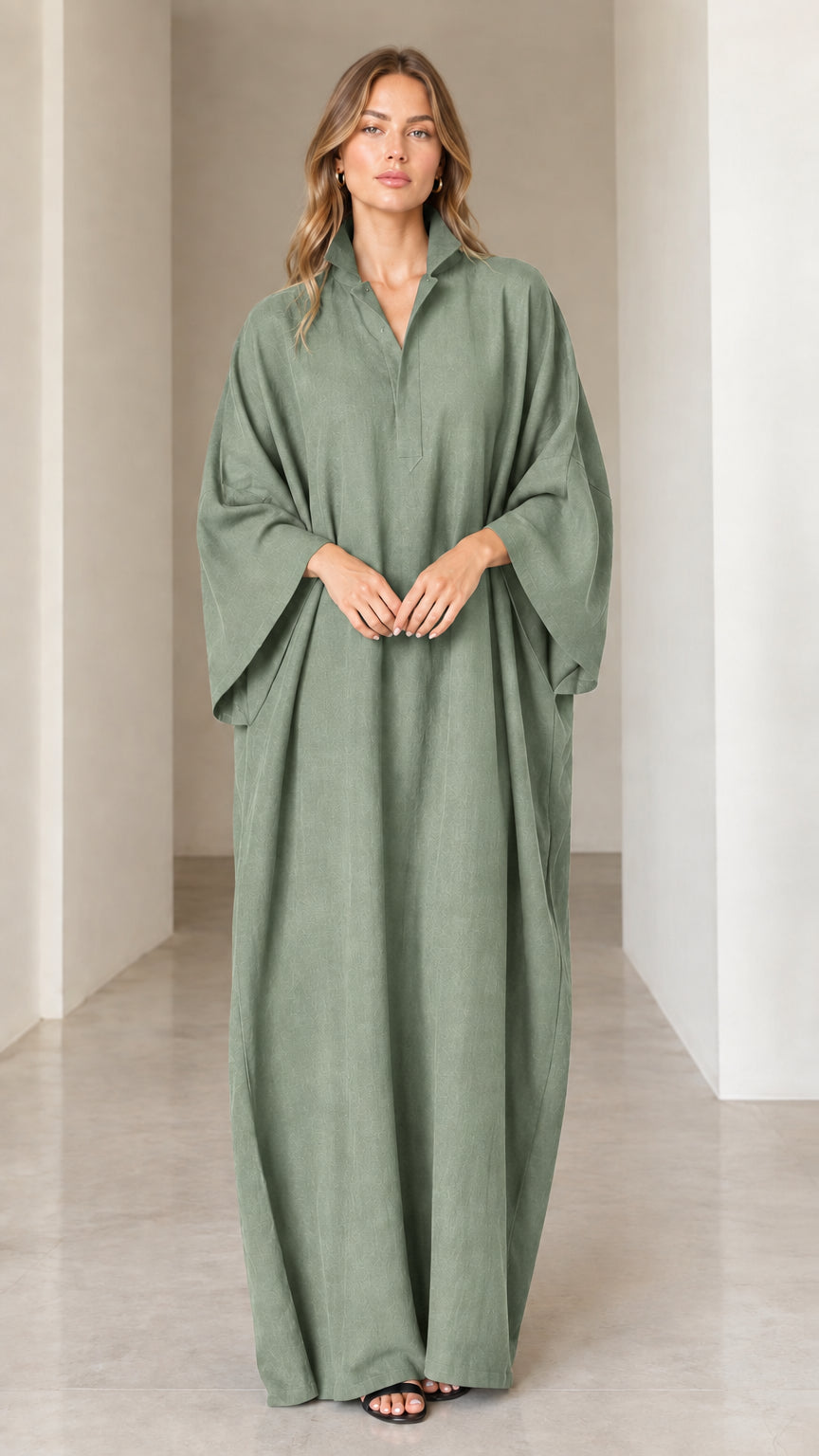 Model wearing sage green loose long-sleeve maxi kaftan dress