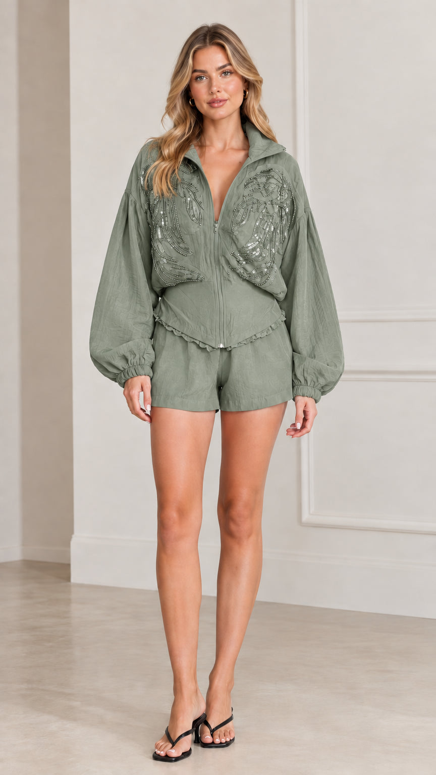 Full front view of women's sage green embellished zip jacket and shorts set