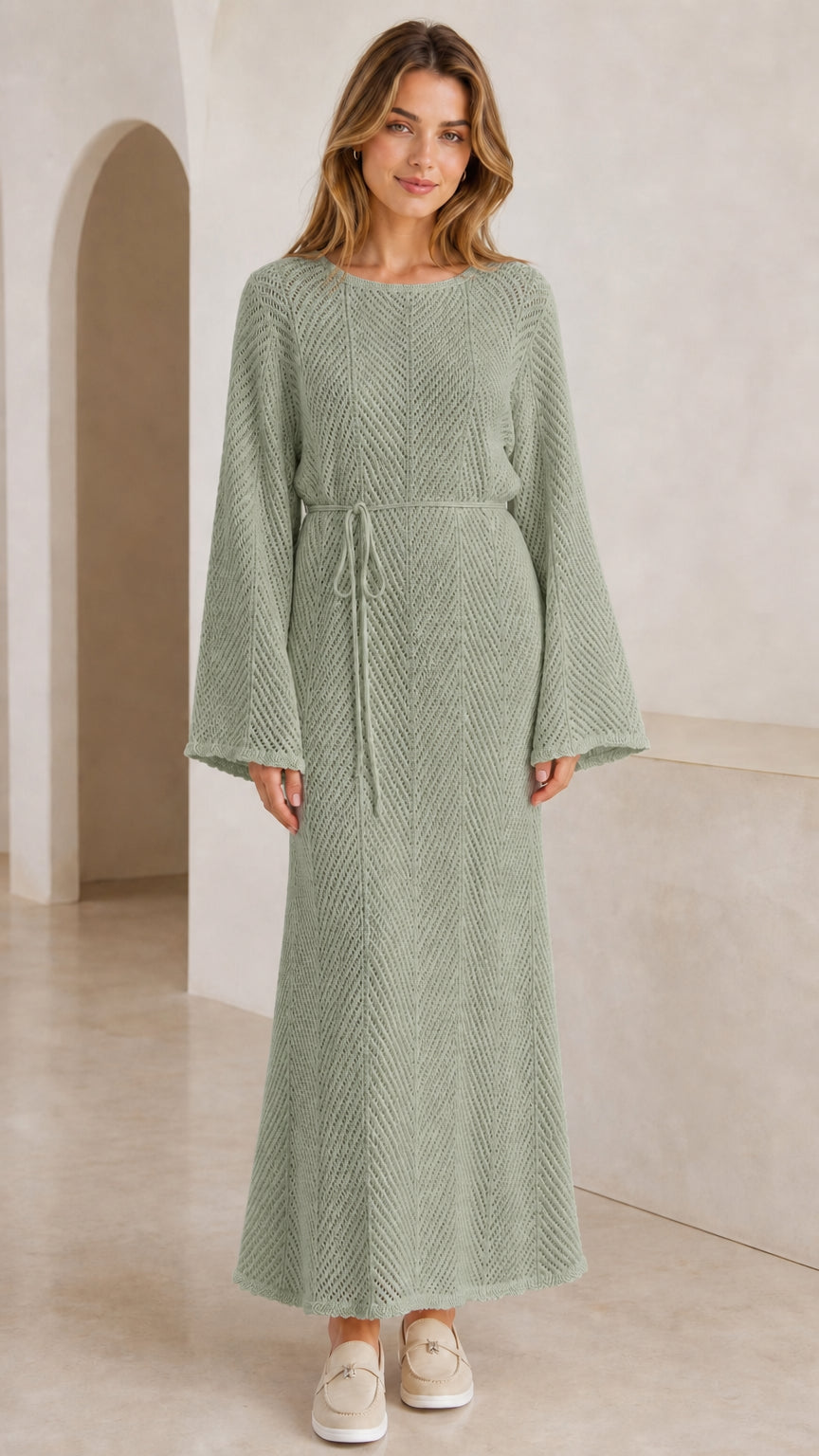 Front view of model wearing sage green textured knit bell sleeve maxi dress