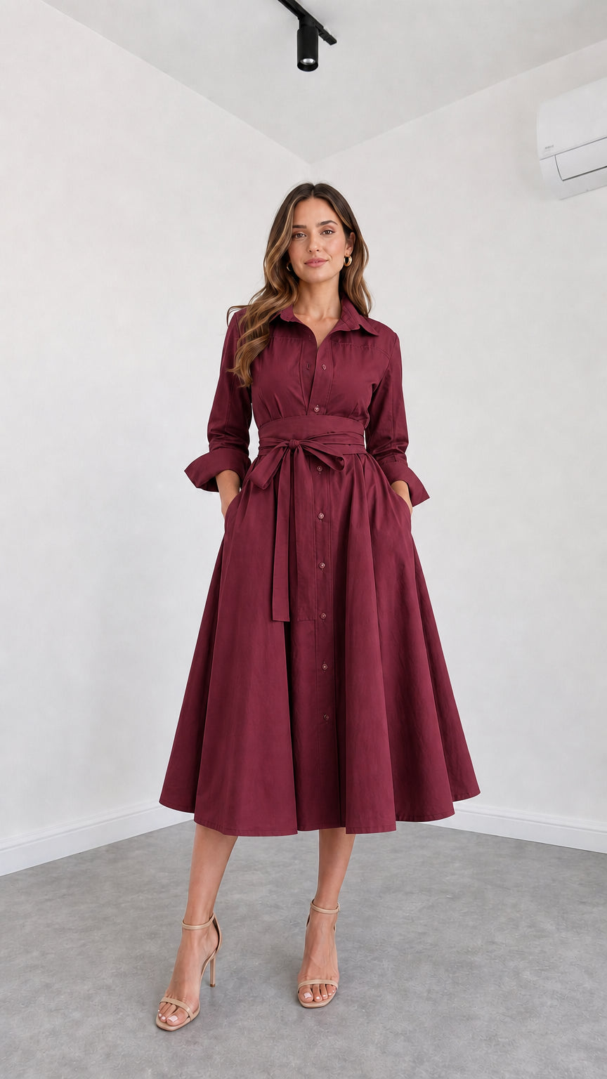Front view of model wearing Burgundy button-down belted midi shirt dress