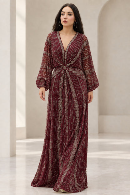 Front view of Burgundy sequin and beaded long sleeve formal evening dress