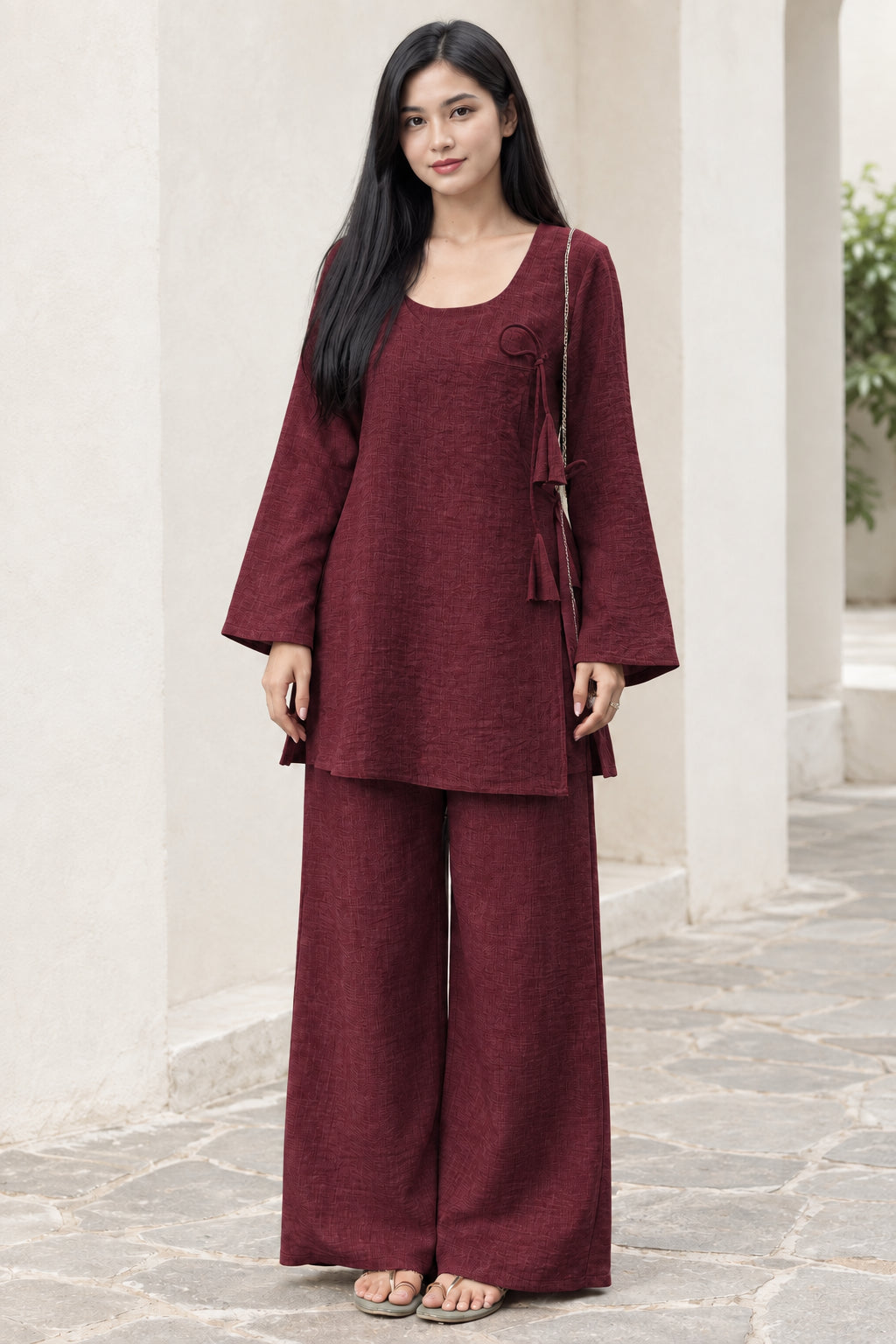 Front view of woman wearing Wine Red side-tie tunic and wide leg pants set