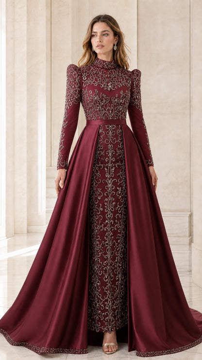 Model wearing rich burgundy wine red beaded evening dress with full satin overskirt