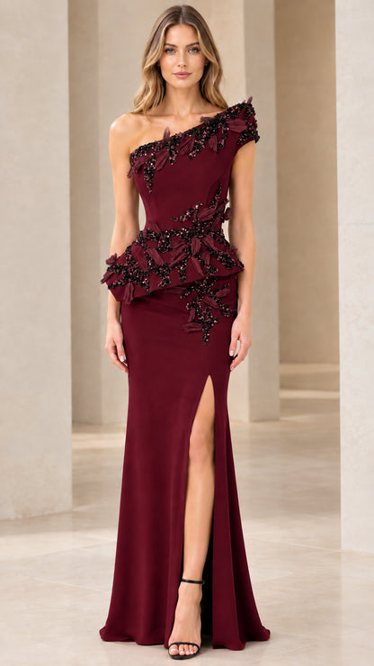 Front view of model wearing Burgundy one-shoulder beaded peplum evening gown