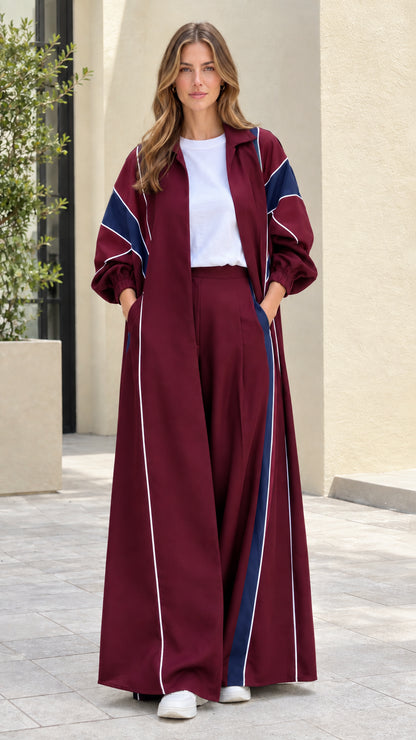 Front view of burgundy red colorblock long duster and wide-leg pants set