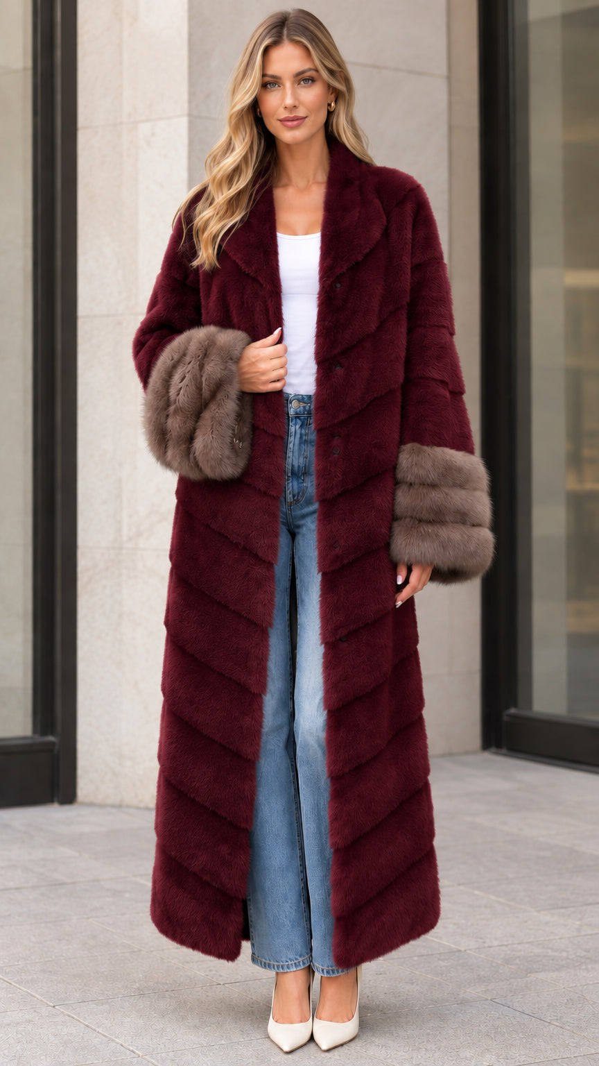 Front view of burgundy chevron maxi faux fur coat with brown plush cuffs