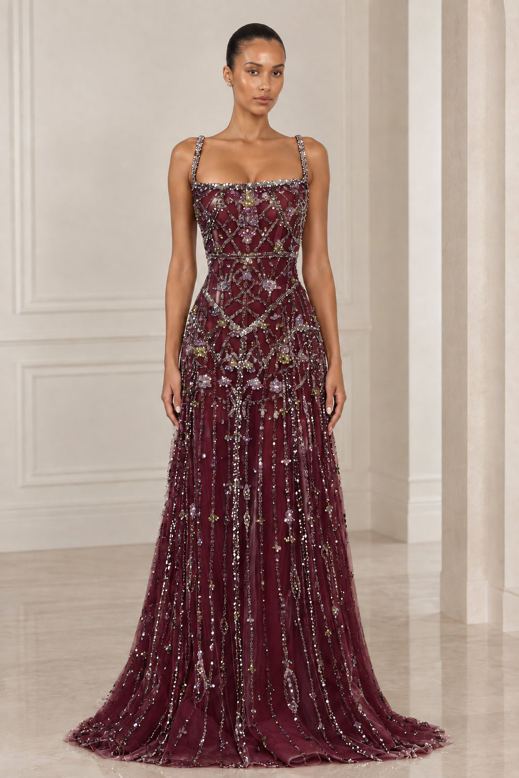 Front view of model wearing Burgundy wine crystal embellished evening gown