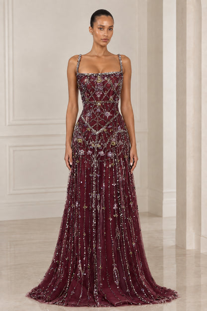 Front view of model wearing Burgundy wine crystal embellished evening gown
