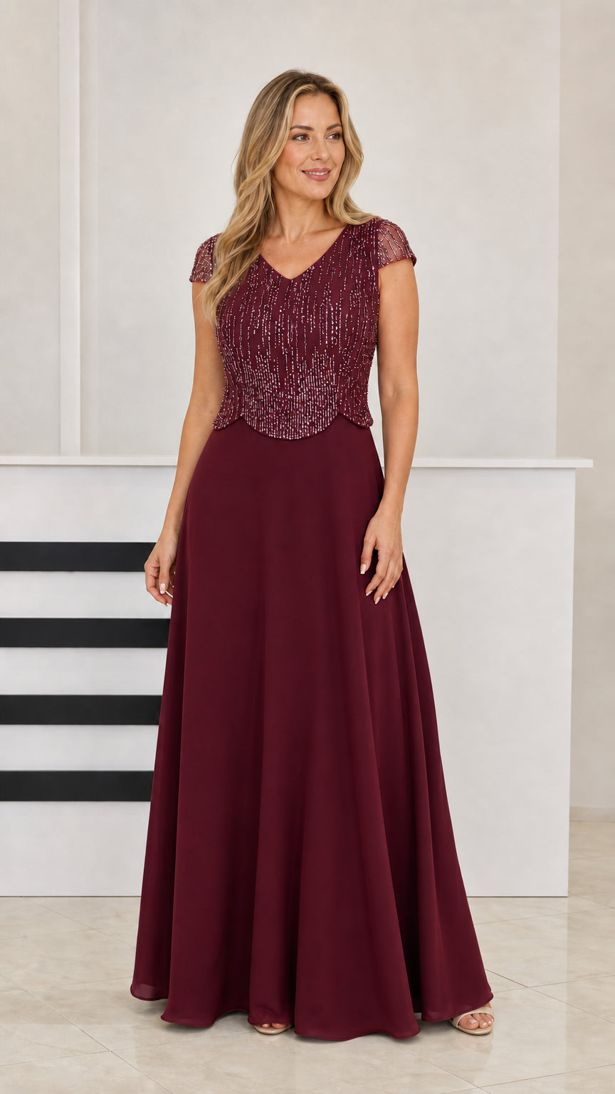 Woman wearing Burgundy wine beaded V-neck formal gown